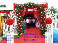 Cổng cưới đi tông hoa màu đỏ kết hợp với hoa văn CNC đẹp